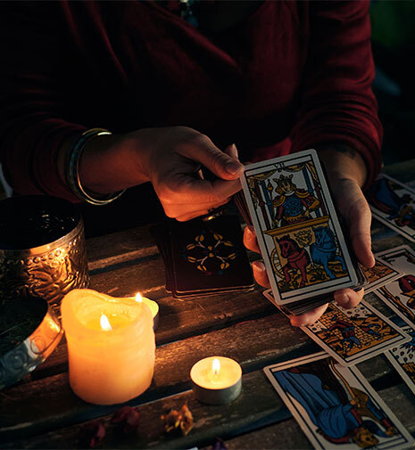 woman reading tarot cards