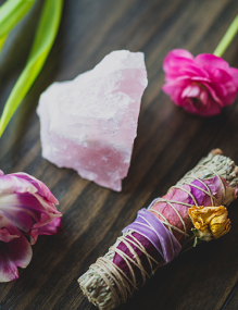 stone with flowers and herbs